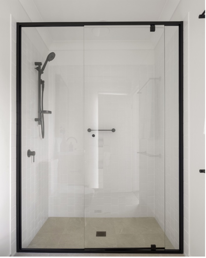 Munro by Azure Bathroom Two Munro by Azure bathroom two featuring Nero Builder Project rail shower, Nero Dolce shower mixer, ACL Otus slimline shelf and Austworld floor grate in matte black.